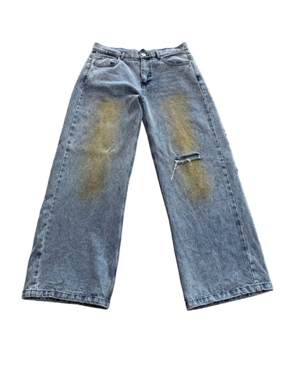 Lutte Révoltée Distressed Jeans ‘Light Blue’